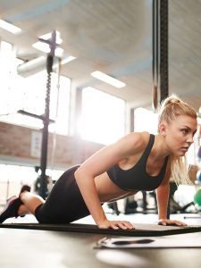 Woman working out during a fitness class